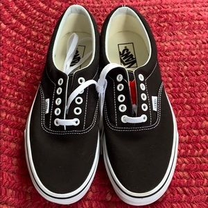 Size 9 Men’s black and white Era Vans.